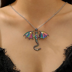 Detailed view of colorful enamel dragon pendant necklace with rhinestones on model