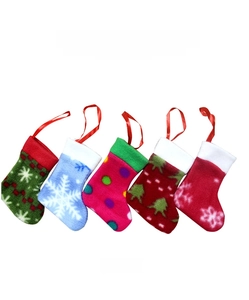 Mini felt Christmas stockings set with snowflake patterns and hanging loops for decor