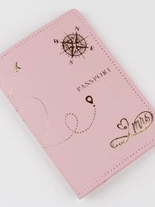 Pink PU leather passport holder with gold heart compass and Mrs stamp on white background