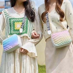 Chic quilted crossbody bag with V-pattern embroidery and colorful gradient finish