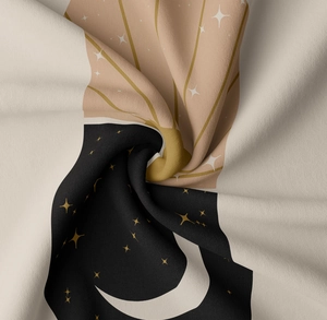 Macro detail of knit fabric featuring celestial sun moon and star bohemian pattern
