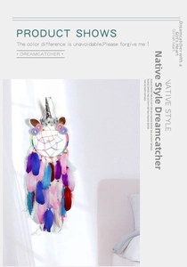 Detailed view of handmade unicorn dreamcatcher with rainbow weaving and soft colorful feathers
