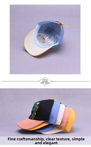 Detailed close-up of cartoon dinosaur embroidery and multi-color kids baseball cap lining