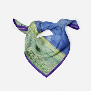 Detail view of Van Gogh style silk scarf with vibrant oil painting patterns and purple edges