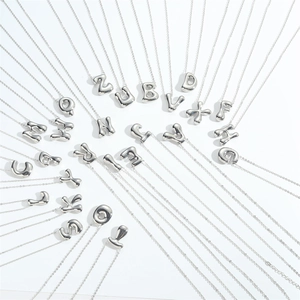 3D puffy letter necklace set in polished silver finish with all twenty-six letters