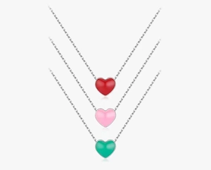 Detailed view of handmade enamel heart pendants in red, pink and green on silver chains