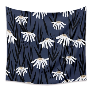 Detailed texture of dark blue tapestry with white daisy patterns and floral motifs