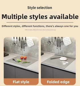 Detail view of smooth brushed stainless steel kneading board with flat and angled edge design