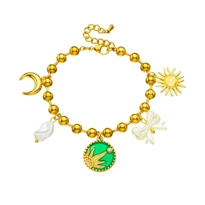 Gold-plated stainless steel charm bracelet featuring moon, sun, pearl, and bow pendants