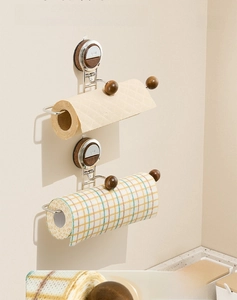 Close-up of walnut wood hook end and metal bracket on a suction cup tissue holder