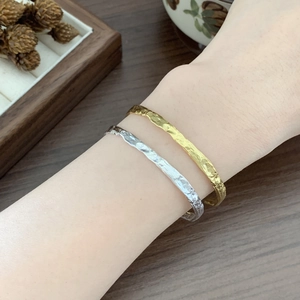 Minimalist S925 sterling silver open bangles with irregular hammered texture in gold and silver