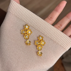 Vintage floral drop earrings in matte gold finish with zircon stone centers for women