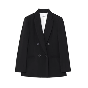 Détail de la veste noire croisée avec étiquette taille S et texture de tissu premium