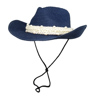 Dark blue woven sun hat with large pearl embellishments and adjustable chin strap