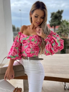 Floral off-the-shoulder crop top with voluminous puff sleeves and pink rose patterns