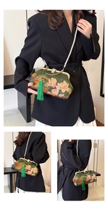 Detail of vintage emerald green floral handbag with pearl chain and elegant green tassel