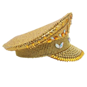 Detail of gold sequins and colorful rhinestones on a decorative captain hat