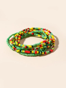 Close-up of colorful handmade bohemian beaded waist chain with vibrant glass beads