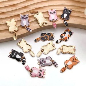 Detail of colorful cartoon cat alloy charms for DIY jewelry making and handmade crafts