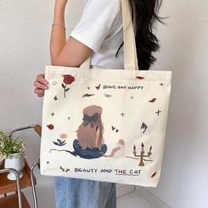 Minimalist beige canvas tote bag with artistic girl and cat illustration and top handle