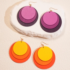 Geometric multilayer circular wooden drop earrings with gold hooks in vibrant color gradients