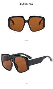 Detailed front and side views of vintage oversized black-tea lens sunglasses for women