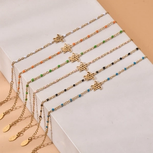 Set of six fashion stainless steel turtle bracelets with colorful beads and gold finish