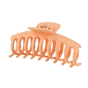 Close-up of matte orange 11cm large hair claw clip with strong metal spring and multi-teeth