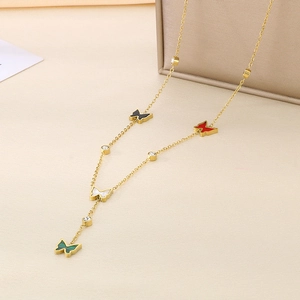 Elegant gold butterfly tassel necklace with multicolor shell charms and zircon accents