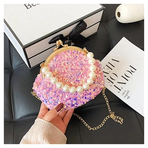Pink sequin mini shell bag featuring pearl bead handle and gold metal chain strap detail