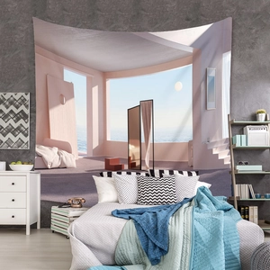 Detail view of Bohemian wall tapestry with surreal pink architecture and moon sea landscape