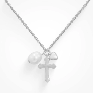 Close-up of twisted rope chain with cross, heart charms and freshwater pearl detail