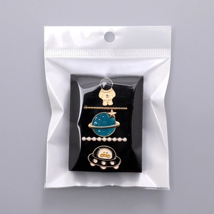 Space theme charms for Apple Watch bands featuring astronaut and UFO designs