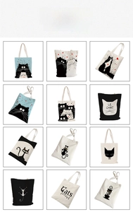 Detail showing 12 different artistic cartoon cat prints on various canvas tote bags