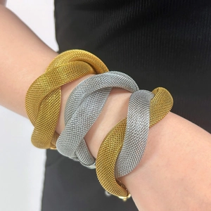 Mesh-woven stainless steel double layer bracelets in gold and silver finish on wrist