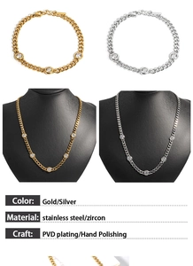 Detail of Gold and Silver Cuban chains with zircons and polished PVD plating finish