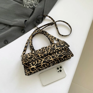Fashionable leopard print faux leather crossbody bag with dual handles and long strap