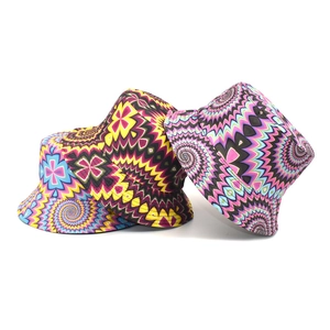 Detailed view of colorful bucket hats with psychedelic geometric patterns and high saturation