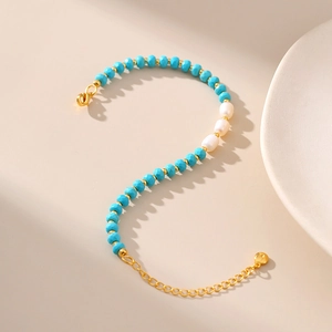 Natural freshwater pearl and turquoise faceted bead bracelet with golden metal accents