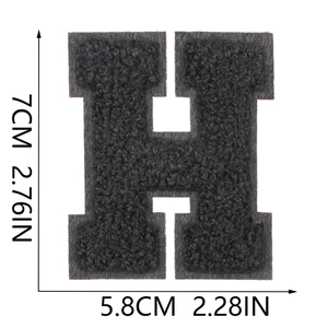 Detail of 7cm black chenille letter H patch with precise height and width dimensions