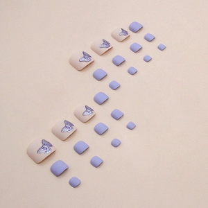 Matte lilac butterfly press-on toe nails set featuring soft pink and purple designs