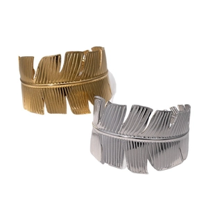Leaf-shaped open stainless steel bangles in gold and silver finishes with vein details