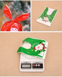 Close-up of Santa Claus gift bag weighing 3g with cute long ears and snowflake patterns