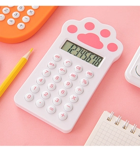 Close-up of cat paw calculator with pink buttons and 8-digit LCD screen on pink background