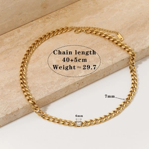 Close-up of gold stainless steel Cuban chain necklace with 6mm sparkling zircon stone