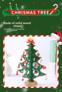 Detail showing hand-painted miniature ornaments on a DIY wooden Christmas tree centerpiece