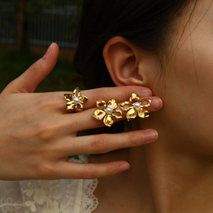 Elegant 18K gold plated flower earrings with white pearl center for a chic look