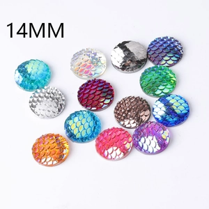 Macro shot of 14mm round colorful resin mermaid fish scale flatback cabochons gems