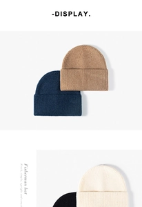 Detailed macro view showing the premium ribbed texture of a soft knit fisherman hat