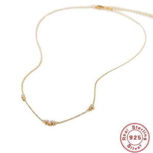 Elegant gold S925 sterling silver layered necklace with triple diamond accents